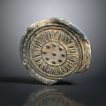Antique Round Ceramic Household Item Featuring Intricate Floral Carved Pattern