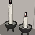 Modern Minimalist Candle Holders with Black Tripod Base and White Candles on White Table