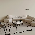 Modern Beige Sofa And Round Coffee Table Set With Area Rug And Accent Chair