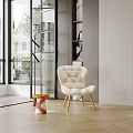 Modern Interior Space Featuring White Tufted Chair Wooden Stool And Glass Door Design