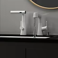 Modern Bathroom Faucet with Water Flowing from White Sink on Black Countertop and Sleek Design