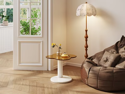 Modern Round Top Side Table With White Base Near Bean Bag Chair And Floor Lamp 3d model