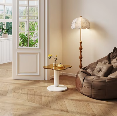 Modern Round Top Side Table With White Base Near Bean Bag Chair And Floor Lamp 3d model