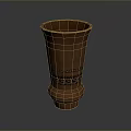 Intricately Carved Brown Clay Vase Sculpture With Decorative Patterns
