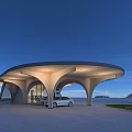 Modern EV Charging Station With Curved Roof White Structure And Blue Sky