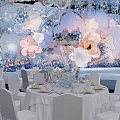 Elegant Banquet Hall With Floral Decorations Hanging Installations And White Chairs