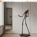 Slim Black Figural Sculpture Holding Long Bar in Modern Minimalist Room