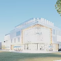 Modern Commercial Complex With Glass Facade Glass Roof Outdoor Lawn Trees And Evening Lighting