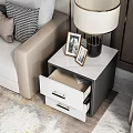 Black and White Bedside Tables with Marble Top Drawers Lamps and Photo Frames