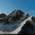 Majestic Snowy Mountain Peaks With Sunrise Light And Misty Valleys In Scenic Range