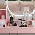 Pink Dressing Table Interior With Organized Cosmetics Skincare And Round Mirror