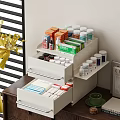 White Multi Layer Medicine Organizer With Drawers Shelves Medicines Bottles Boxes And Yellow Flowers