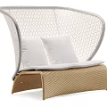Modern Outdoor Sofa With Woven Light Gray Backrest Beige Seat And White Cushions