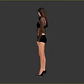 Young Woman In Sheer Black Top And Black Shorts Standing Against Gray Background