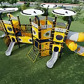 Outdoor Playground Equipment With Yellow Structure Slides Climbing Frames Round Canopies On Green Lawn