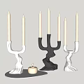 Modern Curved Candle Holders In White Black Silver With Lit Candle On Tabletop