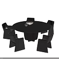 Modern Dark Round Dining Table Set with Four Chairs Bowl and Decorative Ornament