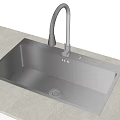 Modern Black Kitchen Sink With Undermount Design And Silver Gooseneck Faucet On Light Countertop