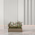 Bonsai Potted Plant in Wooden Pot with Green and Purple Foliage Against Striped Wall