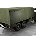 Military Green Utility Vehicle Featuring Canvas Cargo Bed And Off Road Tires