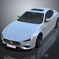 White Maserati Sports Car With Sleek Design Sunroof Modern Exterior And Alloy Wheels