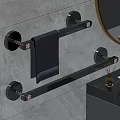 Black Bathroom Towel Rack With Gray Towel On Tiled Wall And Round Mirror