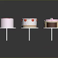 Assorted Colorful Decorated Small Cakes With Various Shapes And White Bases