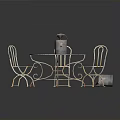 Outdoor Furniture Set With Round Table Four Chairs And Watering Can On Green Lawn