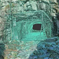 Scenic Rocky Cave Entrance With Metal Framework And Snow Covered Ground
