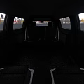 White Cadillac Luxury Limousine Featuring Extended Body And Modern Front Grille Design