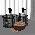 Wire Baskets With Bottles And Bowl Of Walnuts On Kitchen Counter