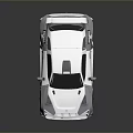 Silver Sporty Car With Sleek Body Rear Spoiler And Black Wheels