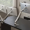 Ergonomic Monitor Stands Supporting Apple Displays On Black Office Desk