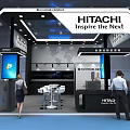 Hitachi Exhibition Booth With Modern Design Digital Screens Lighting And Visitors