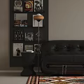 Black Leather Sofa and Glass Coffee Table Set With Green Plant and Wall Painting