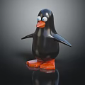 Penguin Toy Figure With Black Body Orange Feet And White Eyes Standing On Reflective Surface