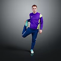 Man Doing Leg Stretch in Purple Active Top and Blue Pants Against Gray Black Background