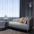 Grey Upholstered Chaise Lounge With Side Table Green Plant And Floor Lamp