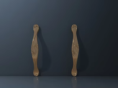 Elegant Golden Cabinet Handles with Intricate Carved Patterns on Dark Background 3d model