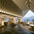 Elegant Hotel Lobby With Wooden Lattice Ceiling Large Windows Mountain View And Round Coffee Tables