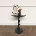 A few round plaster images on the sides of the coffee table 3d model