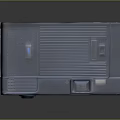 Vintage Blue Portable Computer With Keyboard Area Buttons And Brand Logo