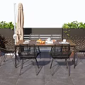 Outdoor Patio Table and Chair Set with Green Plants and Umbrella on Gray Tiles