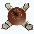 Classic Wooden Round Dining Table Set With Four Patterned Chairs Glass Goblets And Candle Holders