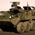 Military Utility Vehicle With Desert Camouflage Multi Wheeled Design Roof Mounted Weapons And Sensors