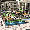 Vibrant Commercial Street With Pedestrians Outdoor Seating Umbrellas Palm Trees And Stylish Buildings