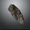 Natural Brownish Gray Stone With Rough Surface On Dark Background