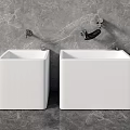 Two White Square Bathroom Sinks Against Gray Marble Wall And Floor With Faucets