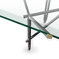 Sleek Glass Top Table With Black Metal Frame And Rolling Wheels Design