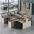 Modern Office Partition Work Desks With Files Potted Plants Computer And Office Chairs